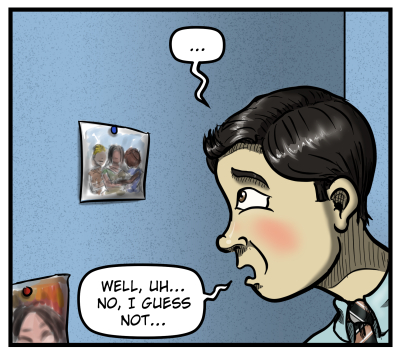 Max looks at a photograph pinned to the cubicle wall and blushes. He says, "Well, uh... no, I guess not..."